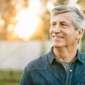 Senior man portrait at sunset